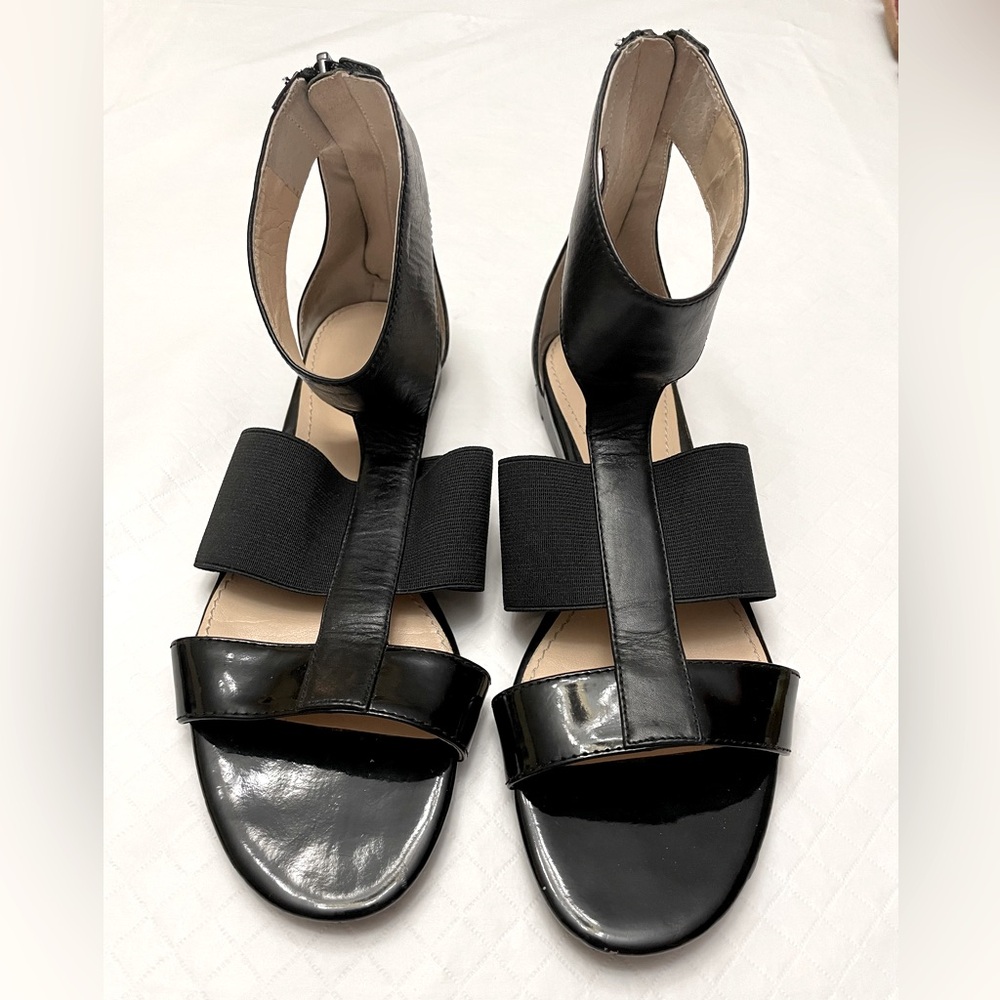 Calvin Klein Size 7-1/2 Black leather Gladiator sandals. Rear zipper Entry.